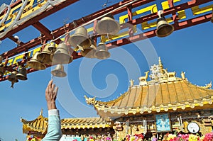 Ring the bell in front of Tibetan Buddhism temple