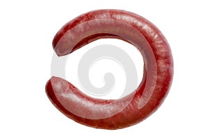 A ring of black pudding on a white background.