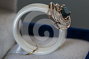 Ring with a blue stone in box