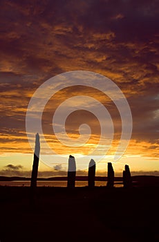 Ring of Brodgar dramatic cloudy sky at sunset, Orkneys, Scotland photo