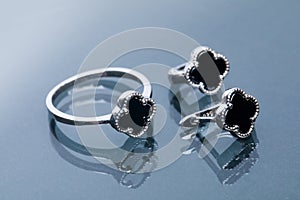 Ring and earrings with black enamel composition- Image