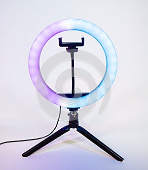 Ring lamp on a small tripod.