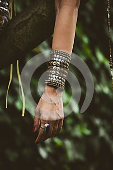 Ring and massive bracelet on woman hand