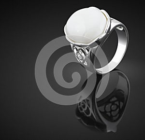 Ring with white gem
