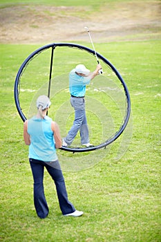 Ring, woman or beginner golfer in golf course lesson for fitness, workout or exercise with a swing on field. Coaching