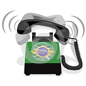 Ringing black stationary phone with rotary dial and flag of Brazil photo