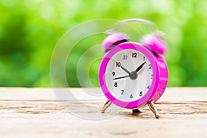 Ringing pink Alarm clock