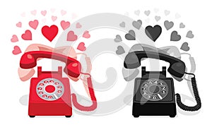 Ringing stationary phone with rotary dial and with hearts photo