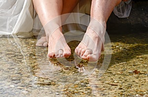 Rings placed on the toes of a newly married couple