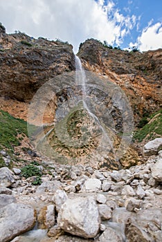 Rinka waterfall in beautiful Alpine valley, Logarska dolina - Logar valley in Slovenia