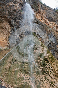 Rinka waterfall in beautiful Alpine valley, Logarska dolina - Logar valley in Slovenia