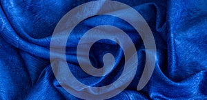 Rinkled blue cotton fabric with visible texture