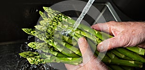 Rinse green asparagus with water