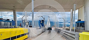 rio antirio bridge greece toll station cords signs patra city