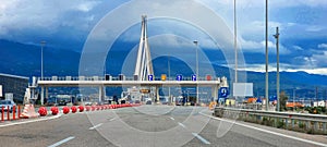 rio antirio bridge greece toll station cords signs patra city
