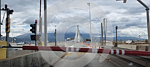 rio antirio bridge greece toll station cords signs patra city