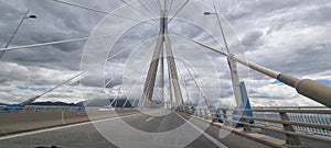 rio antirio bridge greece toll station cords signs patra city