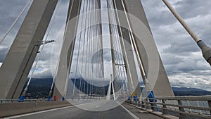 rio antirio bridge greece toll station cords signs patra city