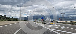 rio antirio bridge greece toll station cords signs patra city photo