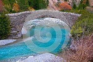 Rio Ara river and bridge San Nicolas de Bujaruelo in Ordesa photo