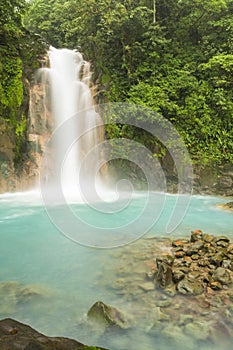 Rio Celeste Waterfall and Sulphurous Rocks