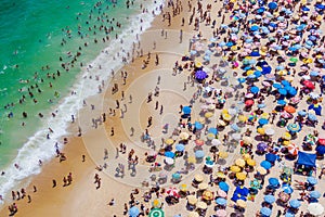 Rio de Janeiro, Brazil, Aerial View of Copacabana Beach Showing Colourful Umbrellas and People Bathing in the Ocean