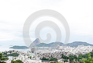 RIO DE JANEIRO, BRAZIL - JANUARY 3, 2020: Panoramic view with copy space of Rio de Janeiro with `Favela`, high-rise buildings of