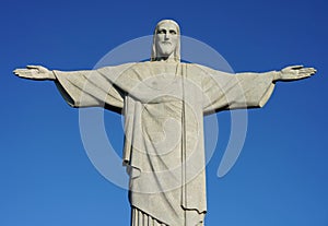 Statue of Christ the Redeemer agaist blue sky on Corcovado mountain, Rio de Janeiro,