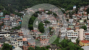 Rio de Janeiro, Brazil. Rio`s favelas surrounded with forested hills