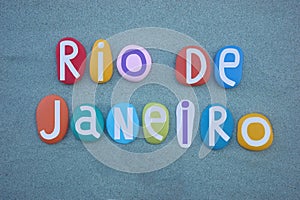 Rio de Janeiro, Brazil, souvenir composed with multi colored stone letters over green sand