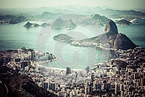 Rio de Janeiro, Brazil. Suggar Loaf and Botafogo beach viewed from Corcovado photo