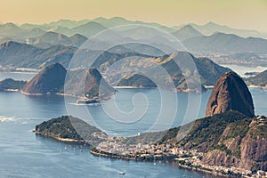 Rio de Janeiro, Brazil. Suggar Loaf and Botafogo beach viewed from Corcovado