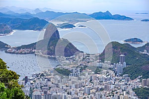 Rio de Janeiro, Brazil. Suggar Loaf and Botafogo beach viewed from Corcovado