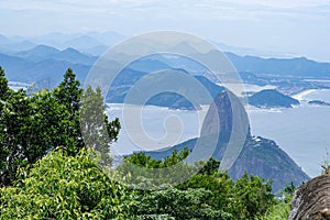 Rio de Janeiro, Brazil. Suggar Loaf and Botafogo beach viewed from Corcovado