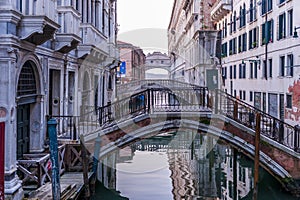 Rio de Palazzo o de Canonica and in the background the sigh bridge in the morning in Venice in Veneto, Italy