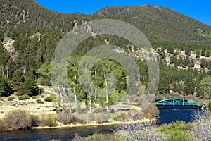 The Rio Grande runs through the San Juan Mountains on the road to Creede in southern Colorado photo