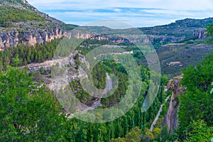 Rio Huecar passing Spanish town Cuenca. photo