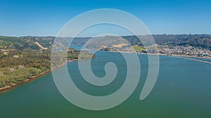 Rio Maule, constitucion, chile, horizontal aerial view with drone of the river photo