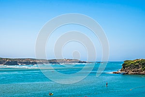 Kayaking and paddle on the beach where the river Mira meets the Atlantic Ocean in Milfontes, Odemira PORTUGAL photo