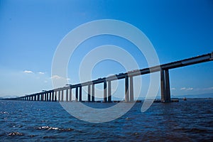 Rio Niteroi Bridge, blue sky and sea