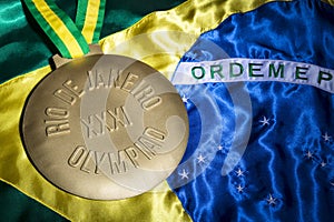 Rio 2016 Olympics Gold Medal on Brazil Flag