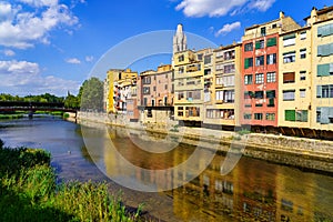 Rio Onyar as it passes through Girona with its colorful houses on both banks of the river, Catalonia, Spain. photo