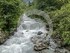 The Rio Solda waterfalls along the road that connects Gomagoi with Solda, South Tyrol, Italy photo