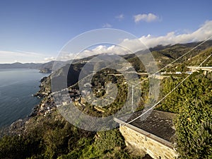 Riomaggiore - Village of Cinque Terre National Park at Coast of Italy. Beautiful colors at sunset. Province of La Spezia, Liguria