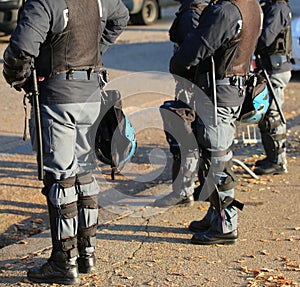 Riot police with helmets before a football game