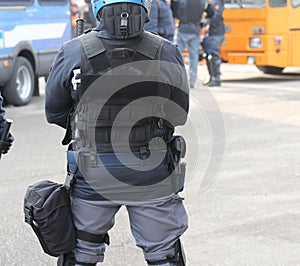 Riot police officer and bulletproof vest during a protest