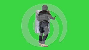 Riot police unit making sound hitting shield with baton on a Green Screen, Chroma Key.