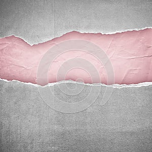 Rip gray end light pink paper background