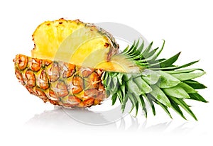 Ripe ananas fruit with green leaves