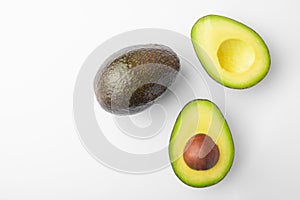 Ripe avocado sliced â€‹â€‹on white background, isolated